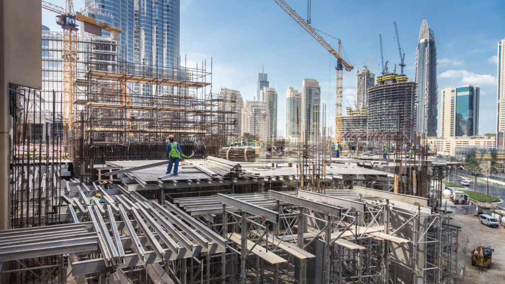 The construction team is reviewing prevailing wage compliance requirements on site.