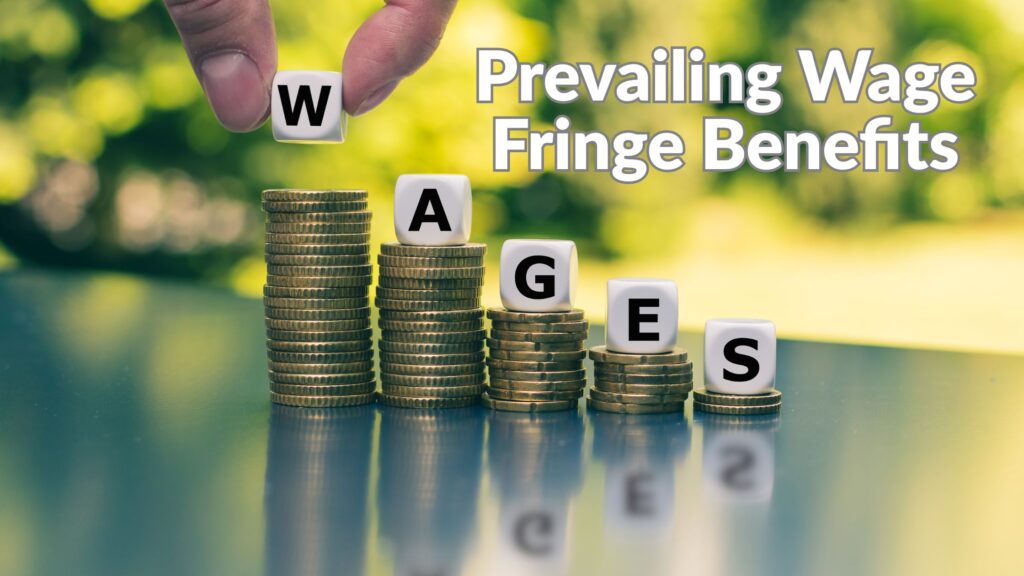 Construction contractor reviewing prevailing wage fringe benefits and certified payroll compliance calculations on a job site.